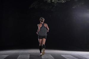 female runner training for marathon photo