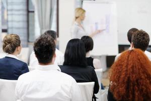 business woman giving presentation photo