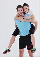 happy young couple fitness workout and fun photo