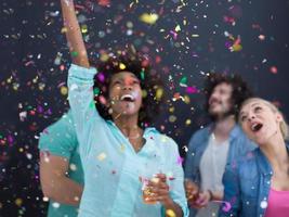 confetti party multiethnic group of people isolated over gray