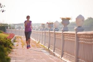 sporty woman jogging photo