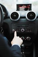 man using car navigation photo