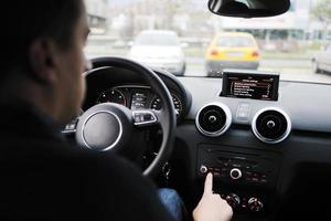 man using car navigation photo