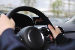 man using car navigation photo