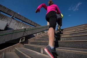 sporty woman jogging on morning photo