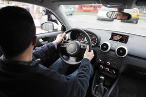 man using car navigation photo