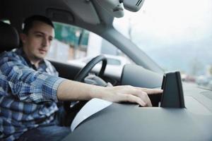 man using car navigation photo