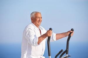 healthy senior man working out photo