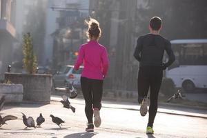 young  couple jogging photo
