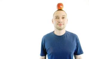 man with apple on head photo