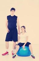 happy young couple fitness workout and fun photo