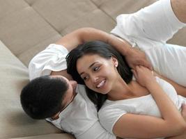 relaxed young couple at home photo