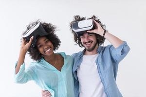 multiethnic couple getting experience using VR headset glasses