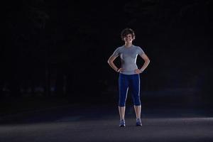 woman  stretching before morning jogging photo