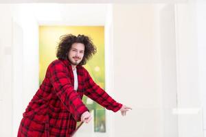 portrait of young man in bathrobe photo