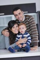 happy young family have fun  at home photo