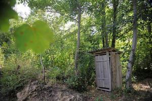 wooden retro outdoor toilet photo