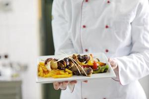 chef preparing meal photo