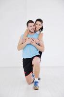 happy young couple fitness workout and fun photo