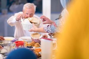 modern multiethnic muslim family having a Ramadan feast photo