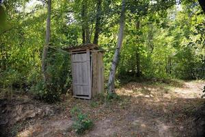 wooden retro outdoor toilet photo