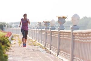 sporty woman jogging photo