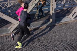 young  couple jogging photo