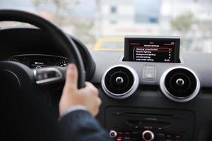 man using car navigation photo