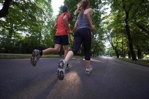 couple jogging outside photo