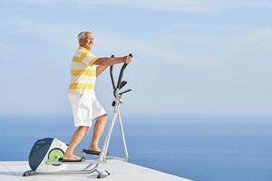 healthy senior man working out photo