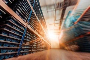 Gold mining storage rock core samples geology drilling industy. Large ore warehouse in modern industry, ores stacked in boxes. Selective focus photo