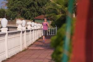 sporty woman jogging photo