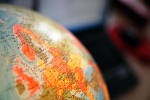 Teamwok concept with hands on globe photo