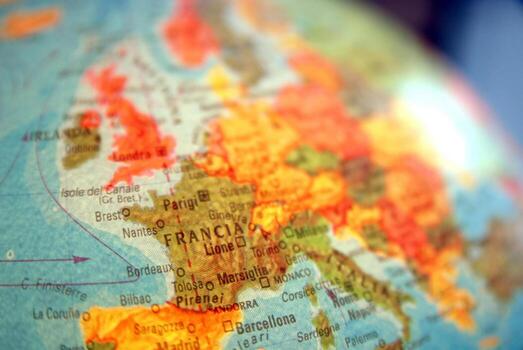 Teamwok concept with hands on globe photo