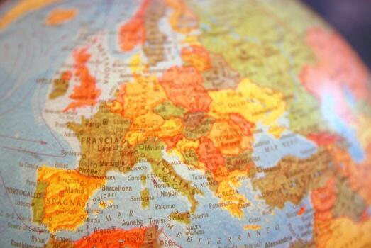 Teamwok concept with hands on globe photo