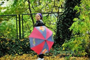 happy girl with umbrella photo