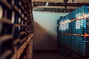 Gold mining storage rock core samples geology drilling industy. Large ore warehouse in modern industry, ores stacked in boxes. Selective focus photo