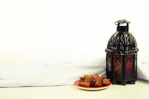 lighted Lantern style Arab or Morocco vintage candle lantern for Muslim community holy month Ramadan Kareem photo