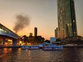 Hello twilight night Chaophaya river skyline colorful waterfront background wallpaper image photo