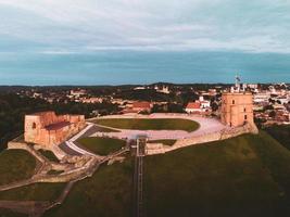 Aerial scenic Lithuania capital city Gediminas castle tower with city scenic panorama. Baltic travel destination in Europe photo