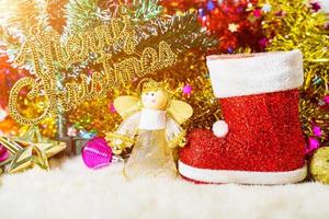 Red Santa claus boot and chrismas doll photo