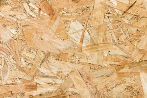 Close up texture of oriented strand board OSB photo