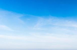 White fluffy cloud in the blue sky photo