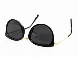 Black sunglasses on white photo