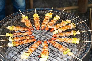 Grilled vegetable and meat skewers photo