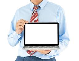 hombre de negocios sosteniendo una computadora portátil con trazado de recorte foto