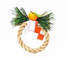 Wreath made of hay on white photo