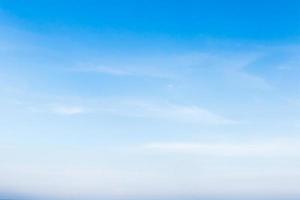 White fluffy cloud in the blue sky photo