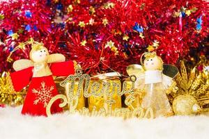 Chrismas doll with Christmas ornaments and decorations photo