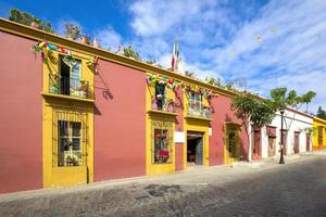 Oaxaca, Mexico, Scenic old city streets and colorful colonial buildings in historic city center photo